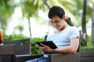 man reading a blog post